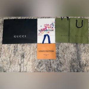 Gucci and Louis Vuitton shopping bags
